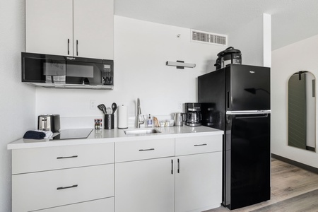 Enjoy a sleek, functional kitchenette built for your stay.