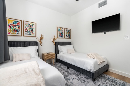 Experience restful nights in these comfortable twin beds.
