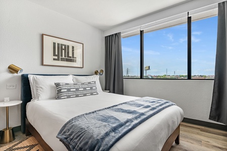 Experience restful nights on a plush memory foam mattress.