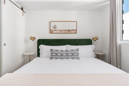 Drift off to dreamland on our memory foam mattress in this cozy bedroom with a smart TV for downtime.