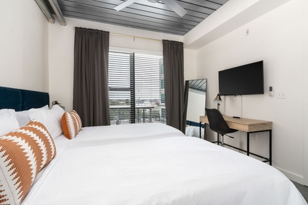 Optional Extra: One bedroom can be set up with two twin XL beds instead of a king for a nighly supplement on extended stays - please contact us for details (this is a photo from another apartment - the apartment has art above the beds))