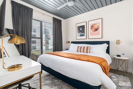 Rest in style on a memory foam bed in this cozy bedroom.