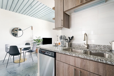 Whip up tasty treats in this modern kitchen with all the essentials.