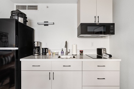 Cook up convenience in our kitchenette, stocked with the essentials.