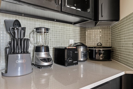 Prepare culinary masterpieces in this modern kitchen with all the essentials.