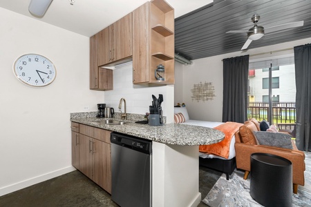 Craft tasty dishes in this contemporary kitchen with all the necessary amenities.