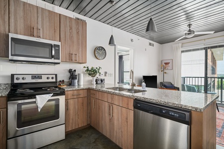 Enjoy cooking in this contemporary kitchen with all the essentials.