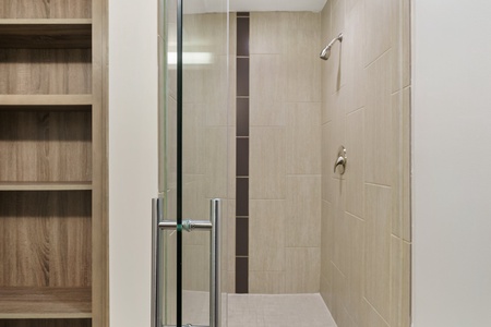 Refresh in the walk-in shower with modern fixtures.