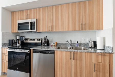 Prepare culinary masterpieces in this modern kitchen with all the essentials.