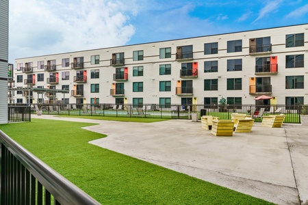 Take a break and unwind in the delightful courtyard with comfortable seating.