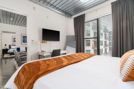 Rest in style on a memory foam bed in this cozy bedroom.