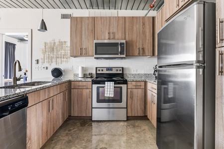 Prepare delicious meals in this modern kitchen with all the essentials.