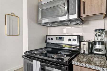 Create magic in this contemporary kitchen with all the necessary amenities.