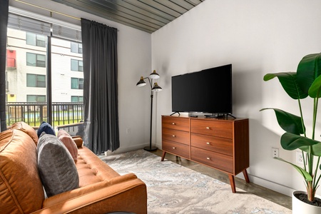 Relax in this inviting living space with a smart TV for entertainment.