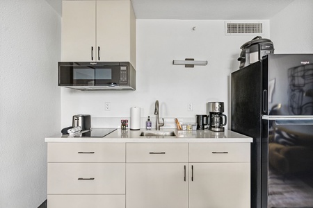Cook up convenience in our kitchenette, stocked with the essentials.