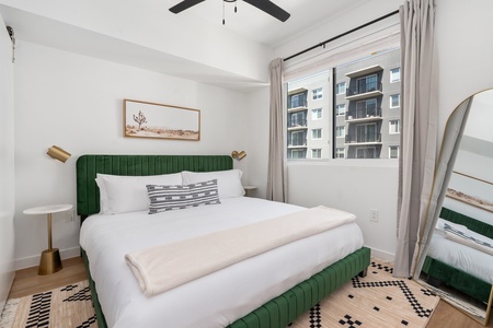 The primary bedroom includes a king-size bed with memory foam mattress and a 40" smart TV (Roku)