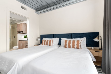 Optional Extra: One bedroom can be set up with two twin XL beds instead of a king for a nighly supplement on extended stays - please contact us for details (this is a photo from another apartment - the apartment has art above the beds))