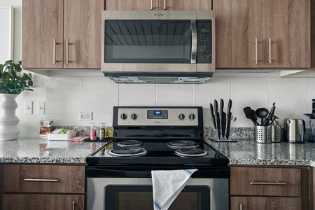 Prepare your favorite dishes in this well-equipped kitchen with modern amenities.