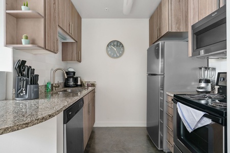 Prepare delicious meals in this modern kitchen with all the essentials.