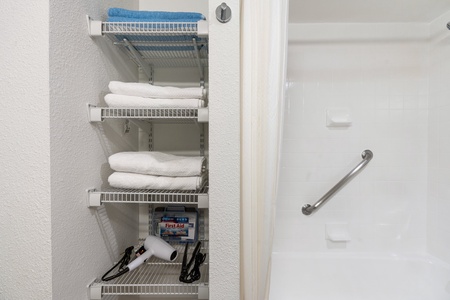 Enjoy a relaxing tub shower with complimentary essentials, including a hairdryer and blow dryer.
