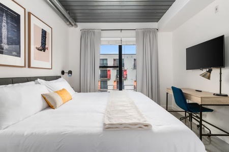 Rest in style on a memory foam bed in this cozy bedroom.