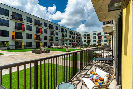 Find serenity in the inviting courtyard with cozy seating.