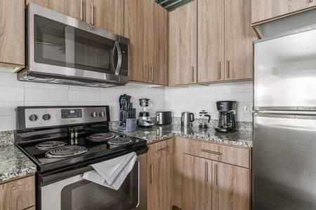 Create magic in this contemporary kitchen with all the necessary amenities.