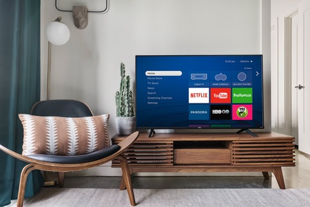 Binge-watch your preferred shows with the smart TV and sound system for streaming.