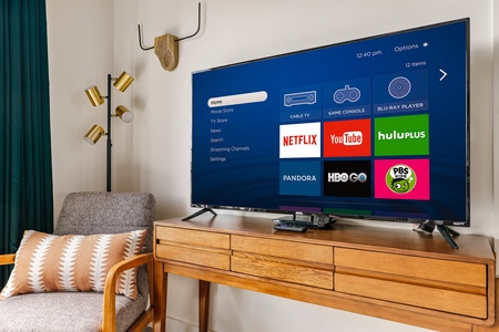 Binge-watch your preferred shows with the smart TV and sound system for streaming.