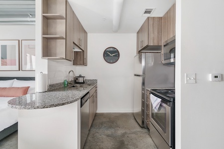 Prepare delicious meals in this modern kitchen with all the essentials.