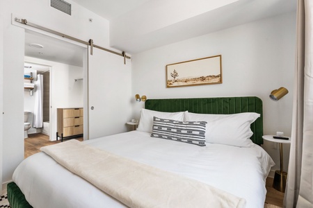 Rest easy on a memory foam bed in this comfortable bedroom.