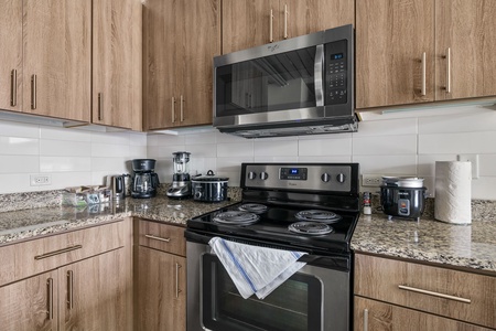 Prepare culinary masterpieces in this modern kitchen with all the essentials.