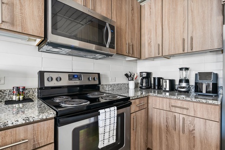 Create magic in this contemporary kitchen with all the necessary amenities.