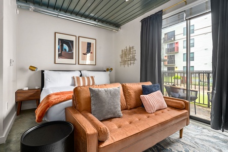Note: These are photos of another unit with identical styling. This listing does not have a sliding door or patio/balcony.