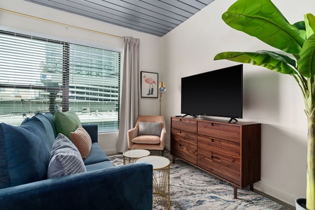 Cozy up in this inviting living space with a smart TV for entertainment.