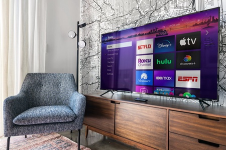 Indulge in relaxation in the inviting living room with a smart TV.