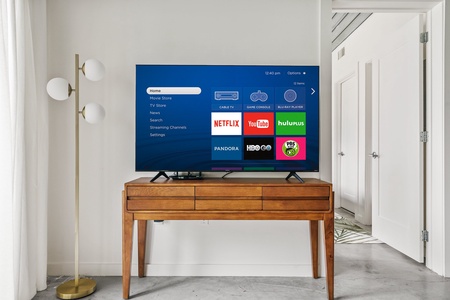 Binge-watch your preferred shows with the smart TV and sound system for streaming.