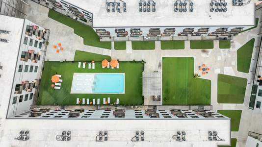 A bird's eye view of the community's swimming pool and courtyard