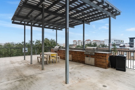 The apartment community features two different communal BBQ grilling areas