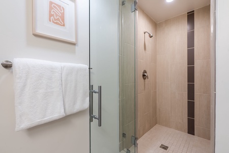 Start your day refreshed in the walk-in shower with modern fixtures.