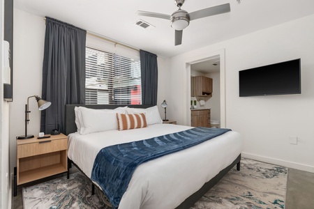 Drift off to dreamland on a memory foam bed in this cozy bedroom.