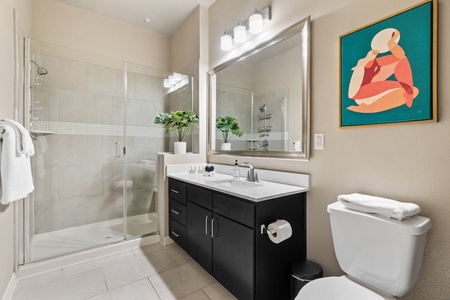 Rejuvenate in the sleek bathroom with complimentary toiletries.