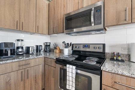 Enjoy cooking in this contemporary kitchen with all the essentials.