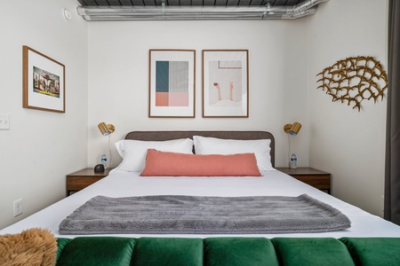 Discover tranquility on a memory foam bed in this inviting bedroom.