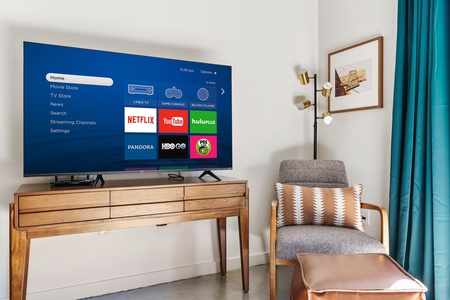 Binge-watch your preferred shows with the smart TV and sound system for streaming.