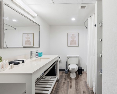 Soft towels and thoughtful bath essentials provided.