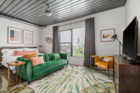 "Nestle in and enjoy the smart TV experience in this sleek modern living area. "