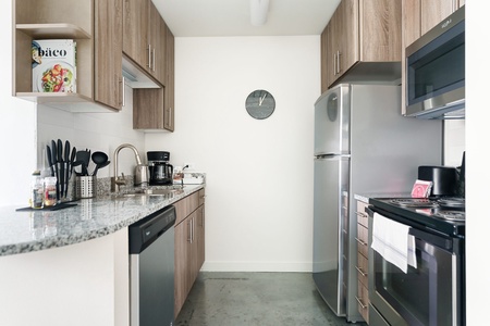 Prepare culinary masterpieces in this modern kitchen with all the essentials.