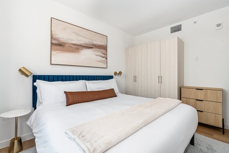 Drift off to dreamland on a memory foam bed in this cozy bedroom.