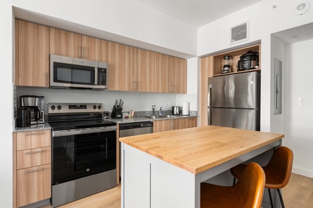 Cook in style and comfort in this beautifully appointed modern kitchen.